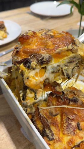 part de lasagne végétarienne à la courge et champignons